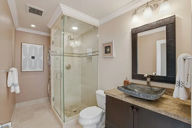 a living room with furniture and a chair