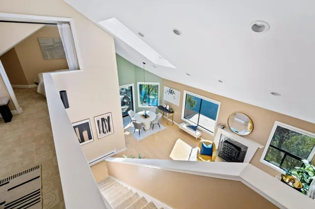 a large white bed in a white room