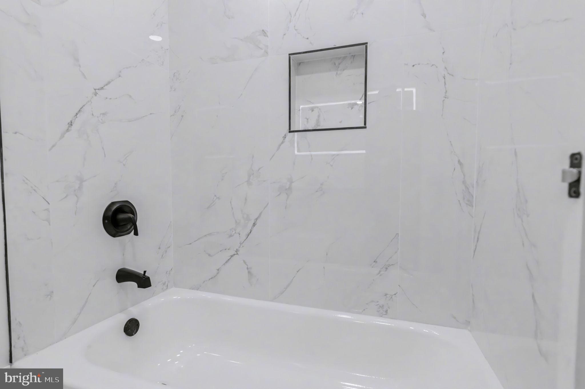 6602 Ian Street Hyattsville, MD 20784 - Photo 14 of 42 Luxurious and Modern Hallway Tub Shower