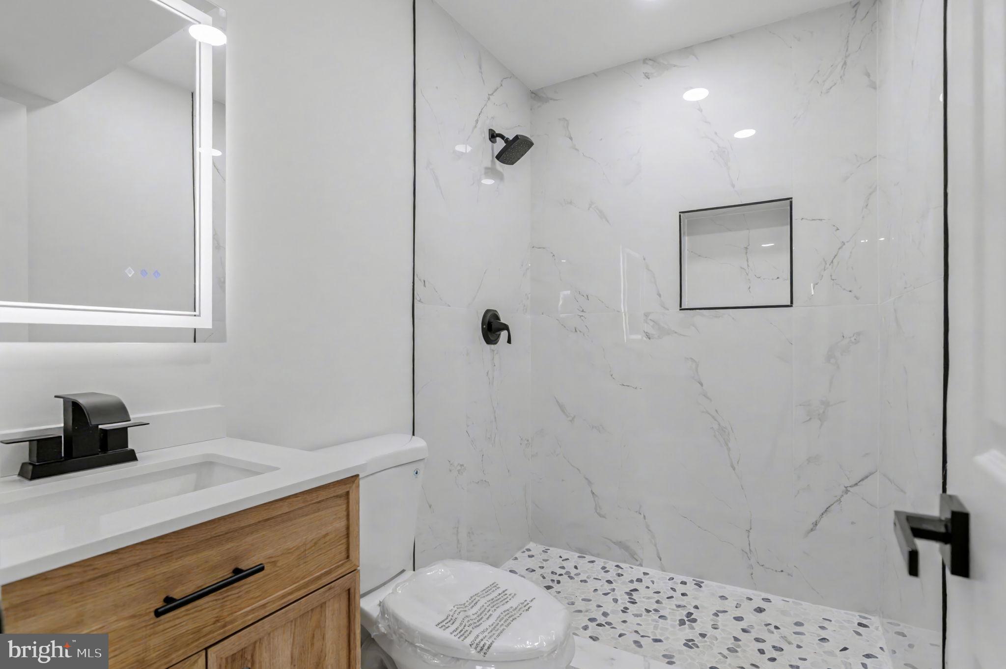 6602 Ian Street Hyattsville, MD 20784 - Photo 37 of 42 Luxurious and Modern In-Law suite private Bathroom