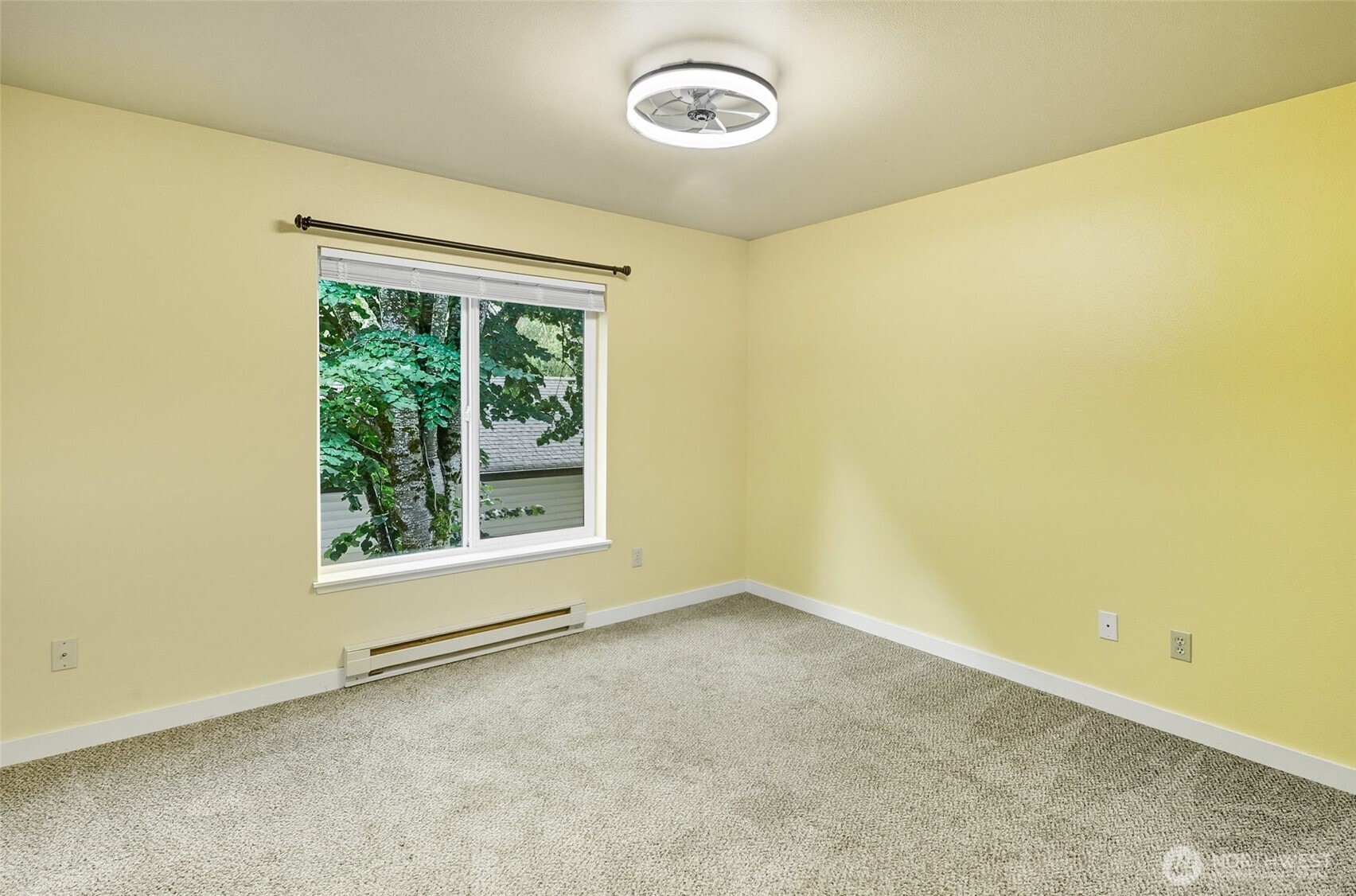 12303 Harbour Pointe Boulevard, Unit Z207 Mukilteo, WA 98275 - Photo 15 of 35 an empty room with a window