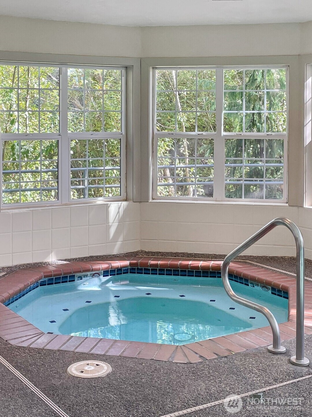 12303 Harbour Pointe Boulevard, Unit Z207 Mukilteo, WA 98275 - Photo 31 of 35 a view of a swimming pool and outdoor space