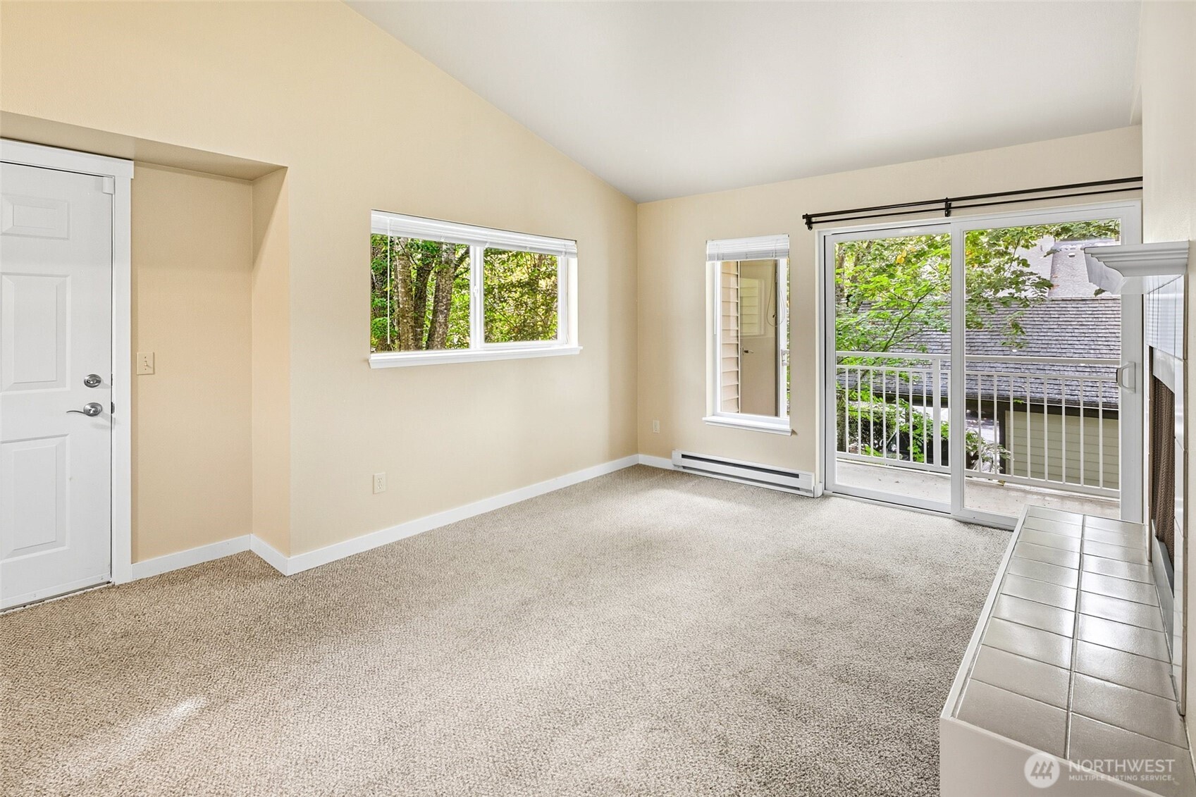 12303 Harbour Pointe Boulevard, Unit Z207 Mukilteo, WA 98275 - Photo 4 of 35 a view of an empty room with a balcony