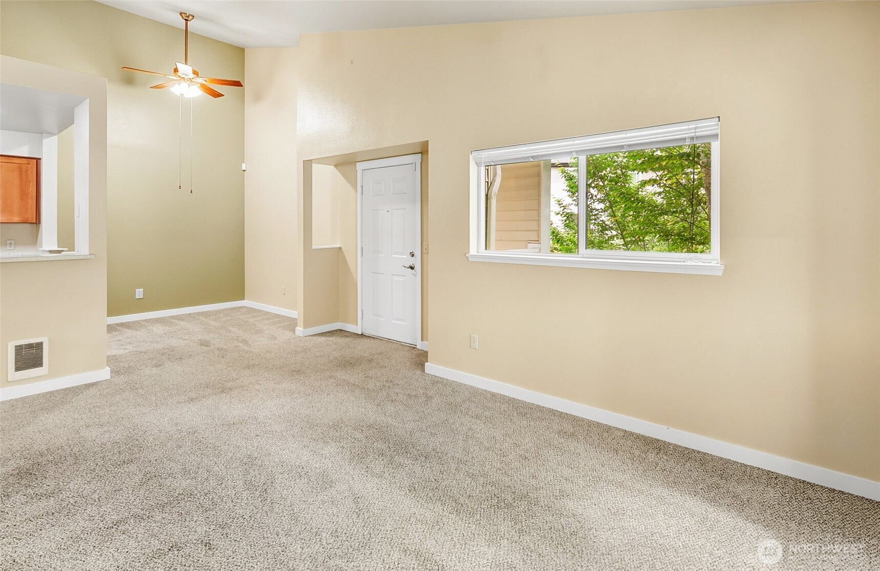 12303 Harbour Pointe Boulevard, Unit Z207 Mukilteo, WA 98275 - Photo 6 of 35 a view of an empty room with a window