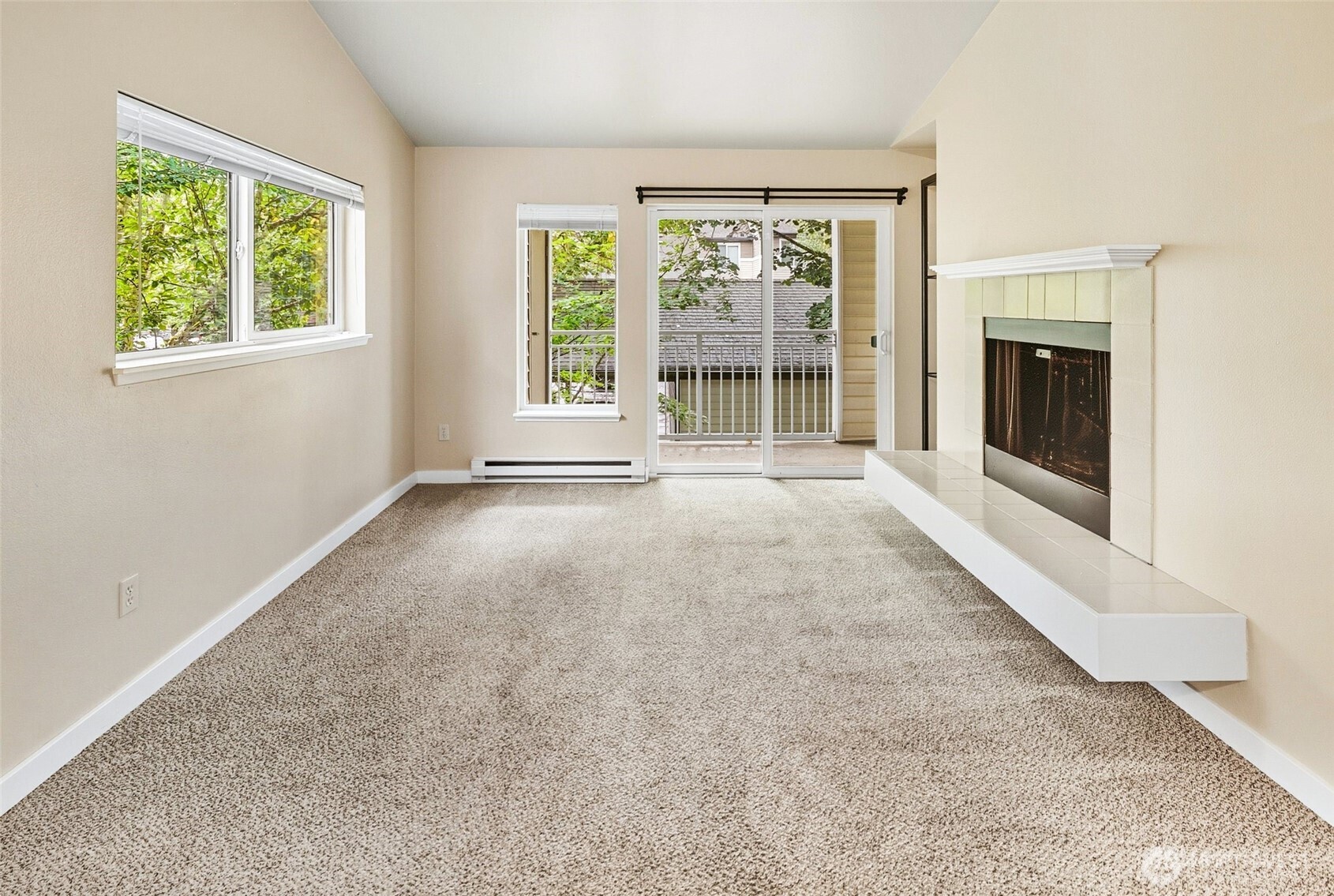 12303 Harbour Pointe Boulevard, Unit Z207 Mukilteo, WA 98275 - Photo 7 of 35 an empty room with windows