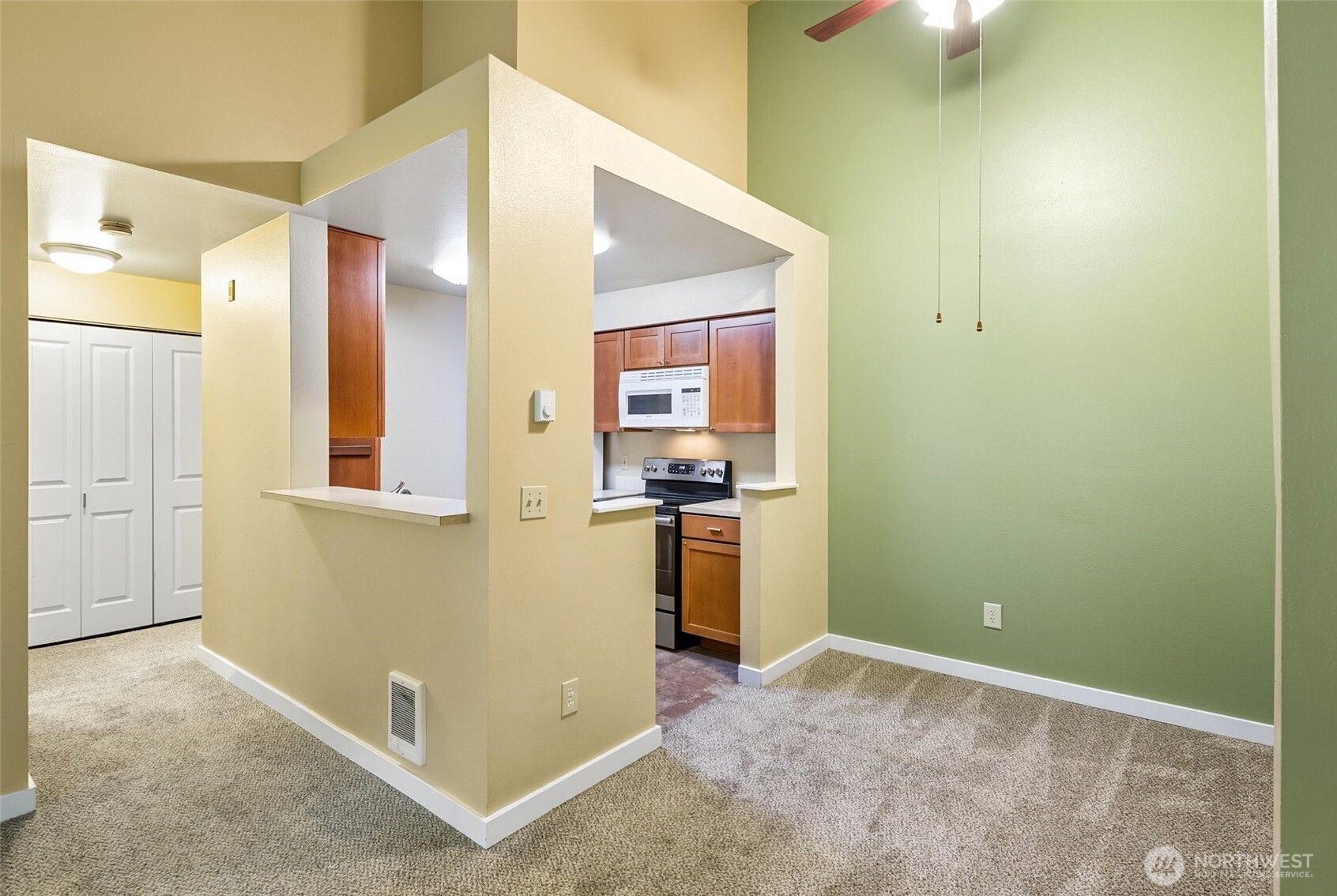 12303 Harbour Pointe Boulevard, Unit Z207 Mukilteo, WA 98275 - Photo 9 of 35 a view of a kitchen cabinets and a utility room
