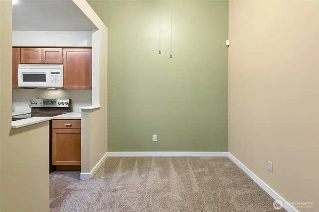a view of a kitchen with a sink