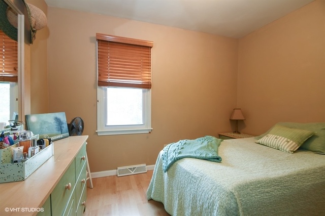 25125 South Rondorey Road Elwood, IL 60421 - Photo 17 of 45 a bedroom with a bed and a window