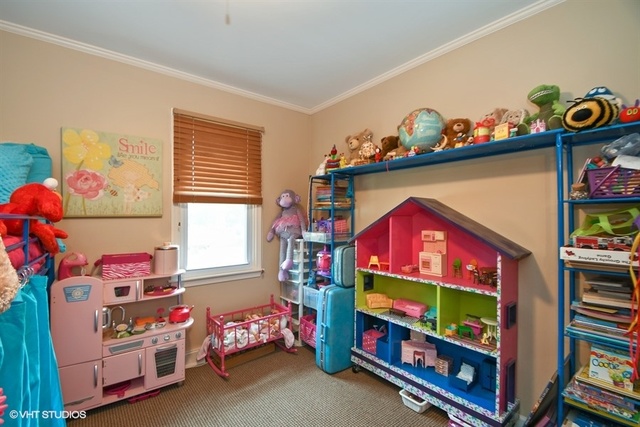 25125 South Rondorey Road Elwood, IL 60421 - Photo 18 of 45 a room with toys and a small space