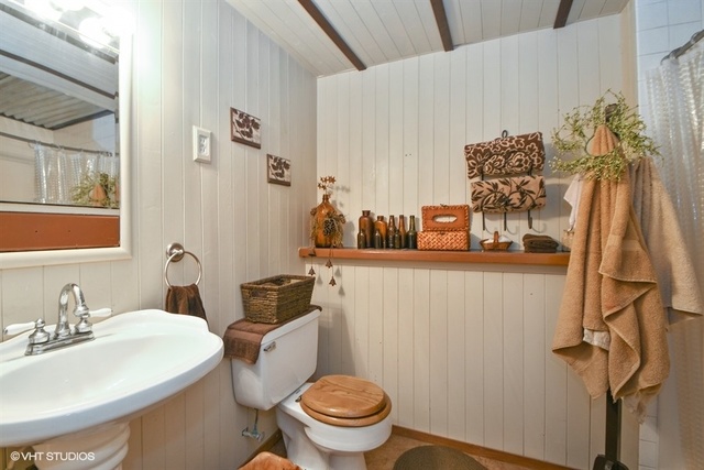 25125 South Rondorey Road Elwood, IL 60421 - Photo 20 of 45 a bathroom with a sink a toilet and a mirror