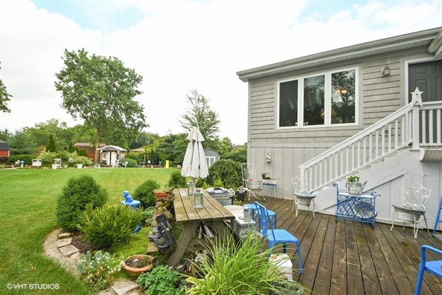 25125 South Rondorey Road Elwood, IL 60421 - Photo 25 of 45 a view of a house with backyard and sitting area