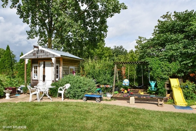25125 South Rondorey Road Elwood, IL 60421 - Photo 29 of 45 a view of a house with backyard sitting area and garden