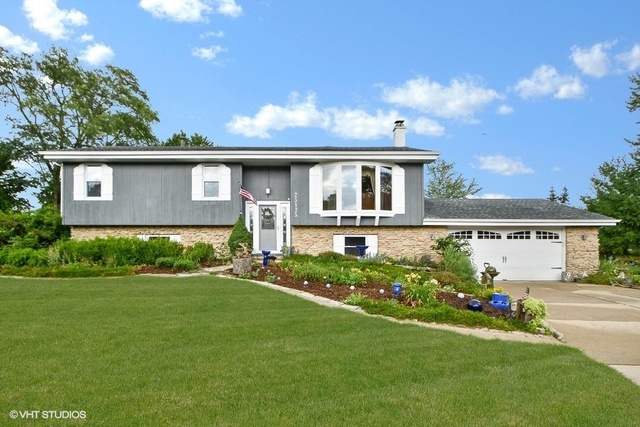 25125 South Rondorey Road Elwood, IL 60421 - Photo 4 of 45 a front view of a house with a yard