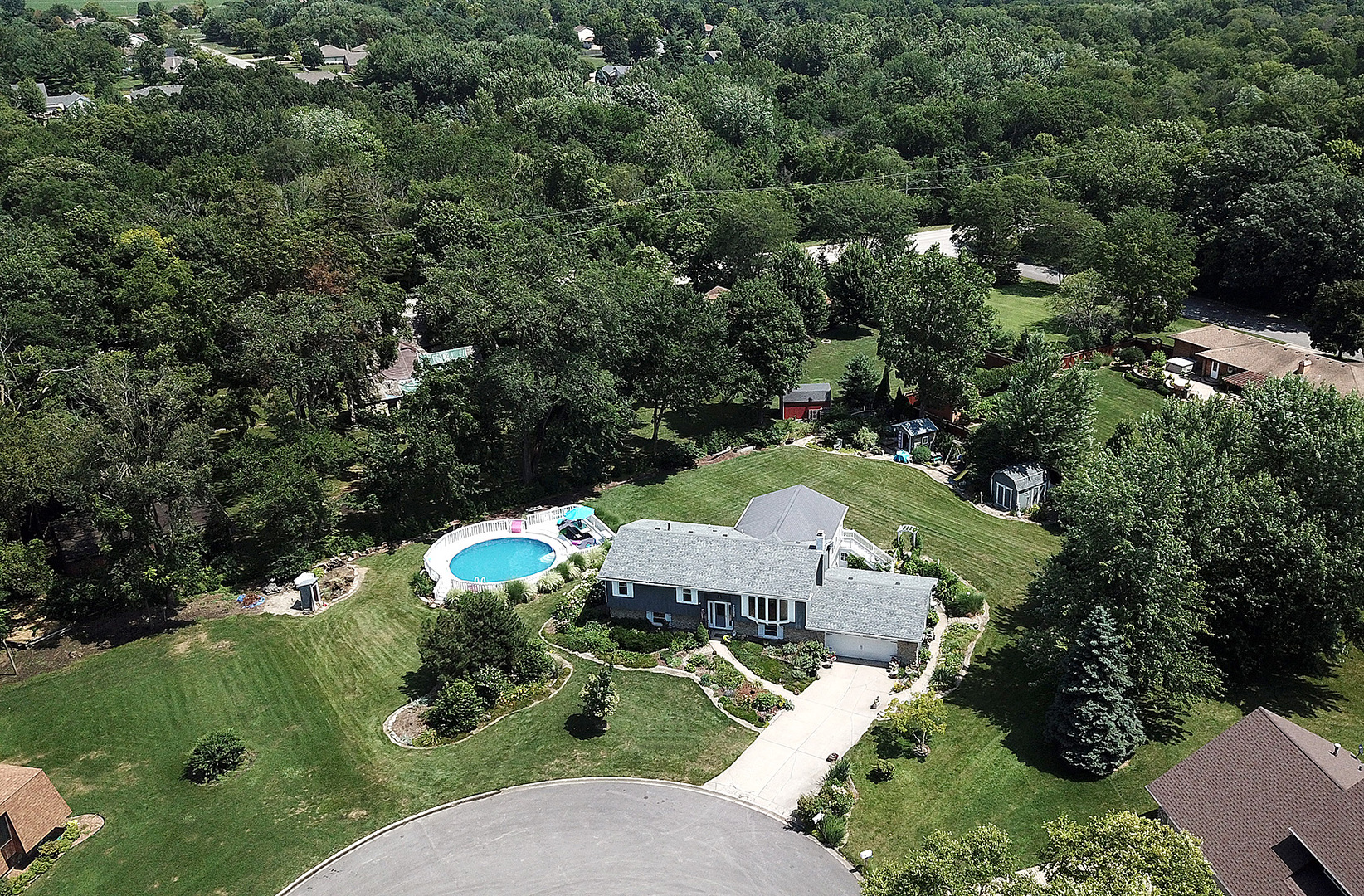 25125 South Rondorey Road Elwood, IL 60421 - Photo 33 of 45 an aerial view of a house with yard swimming pool and outdoor seating