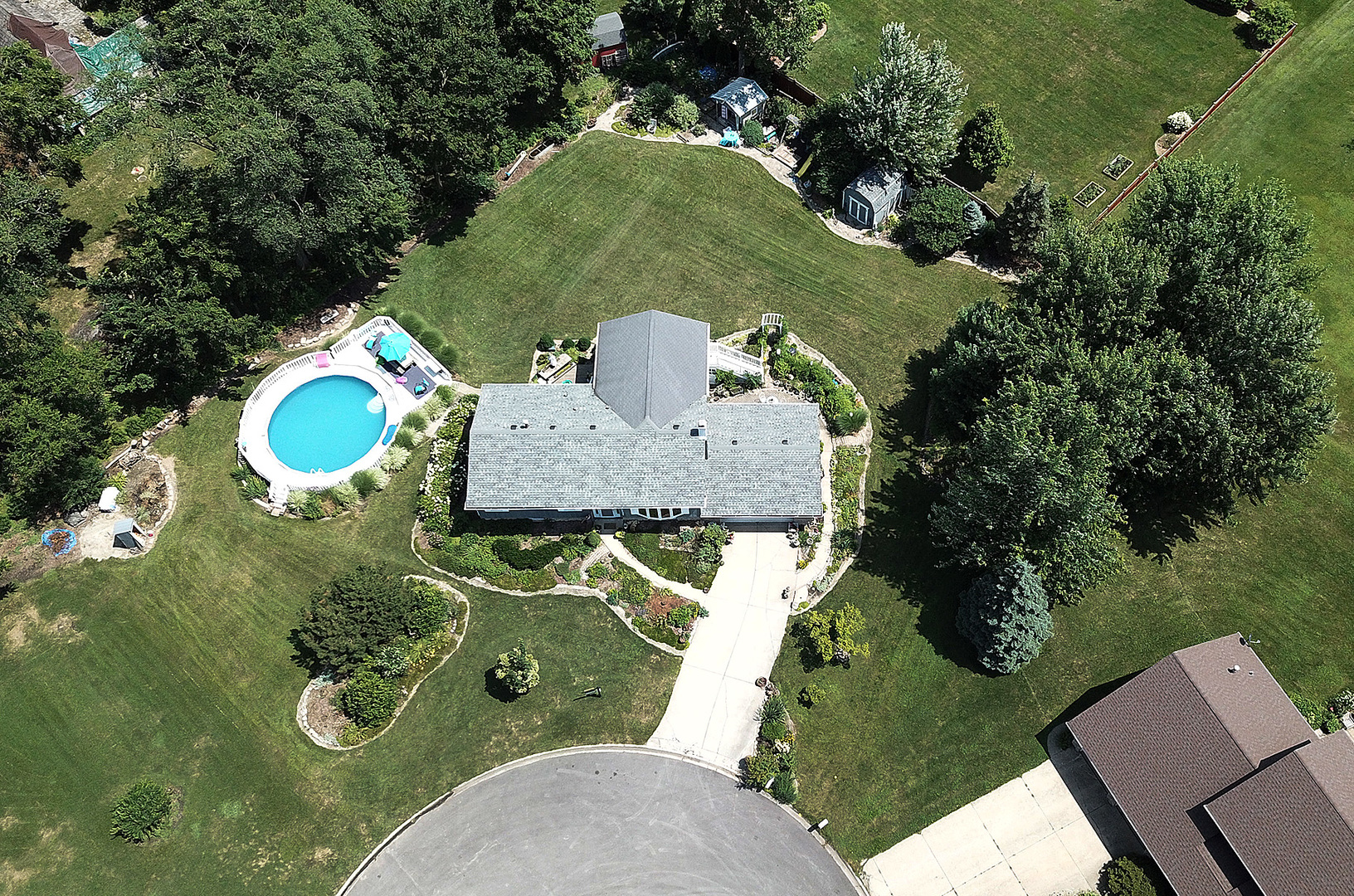 25125 South Rondorey Road Elwood, IL 60421 - Photo 36 of 45 an aerial view of a house with a yard and greenery