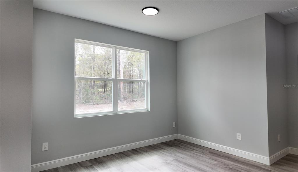 7 Spring Pass Ocala, FL 34472 - Photo 22 of 35 an empty room with a window