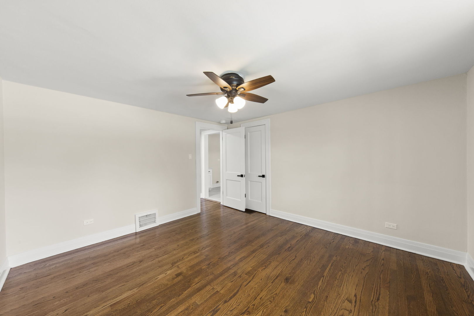 5706 Wolf Road Western Springs, IL 60558 - Photo 25 of 42 wooden floor in an empty room