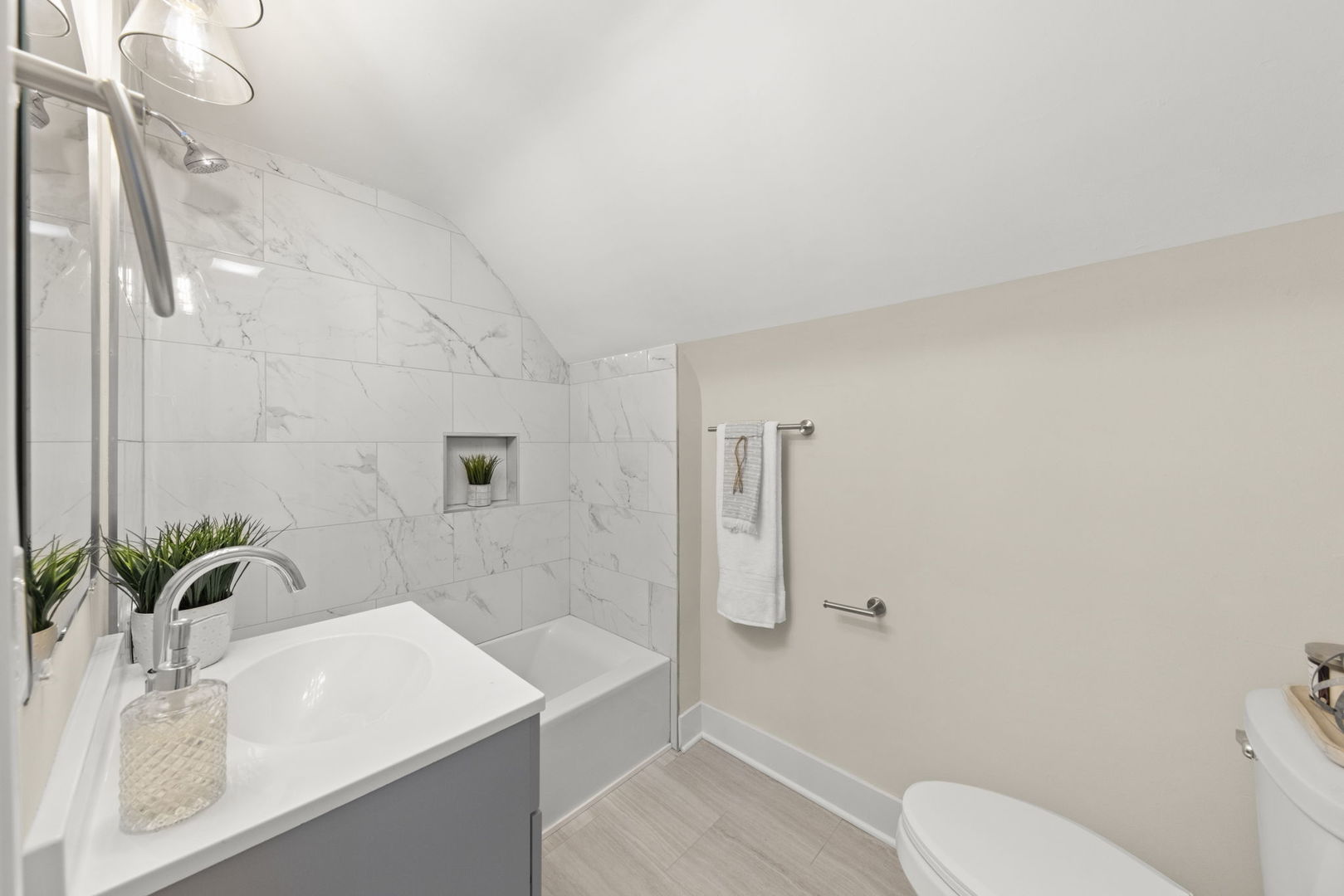 5706 Wolf Road Western Springs, IL 60558 - Photo 27 of 42 a bathroom with a sink a toilet and shower