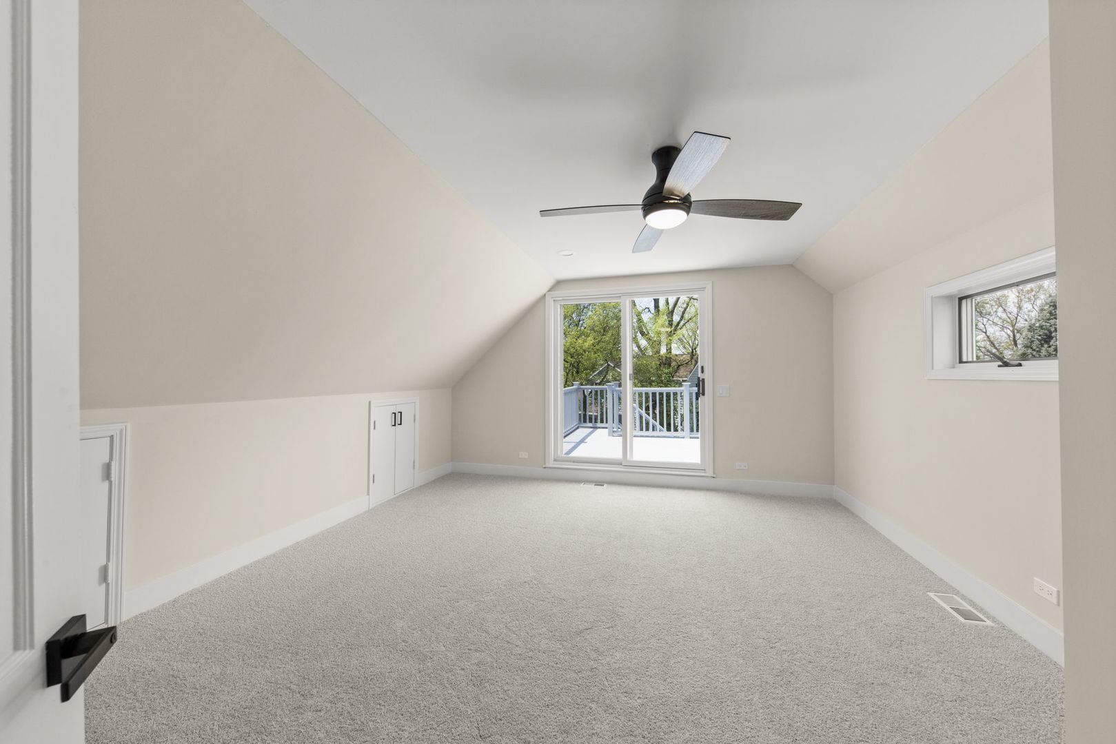 5706 Wolf Road Western Springs, IL 60558 - Photo 28 of 42 an empty room with windows and ceiling fan