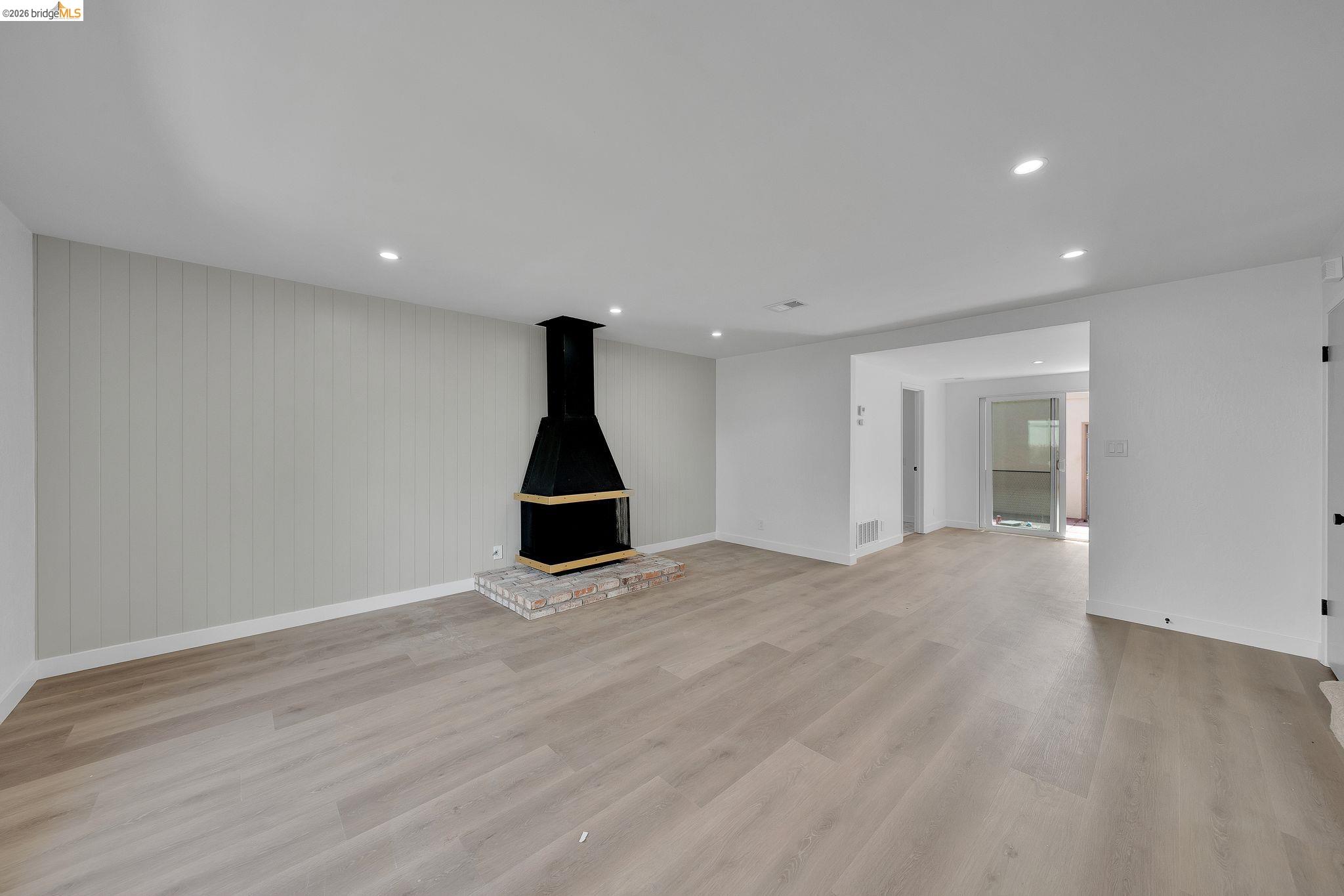1808 Wildbrook Court, Unit D Concord, CA 94521 - Photo 4 of 47 a view of empty room with wooden floor