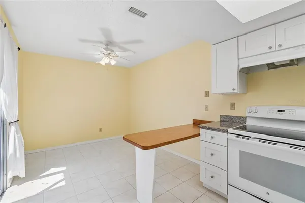 $180,000 | 1130 Orange Tree Circle West, Unit C, Palm Harbor, FL 34684