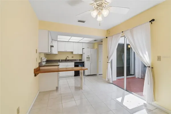 $180,000 | 1130 Orange Tree Circle West, Unit C, Palm Harbor, FL 34684