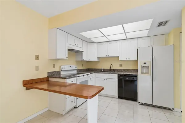 $180,000 | 1130 Orange Tree Circle West, Unit C, Palm Harbor, FL 34684