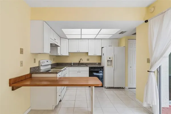 $180,000 | 1130 Orange Tree Circle West, Unit C, Palm Harbor, FL 34684