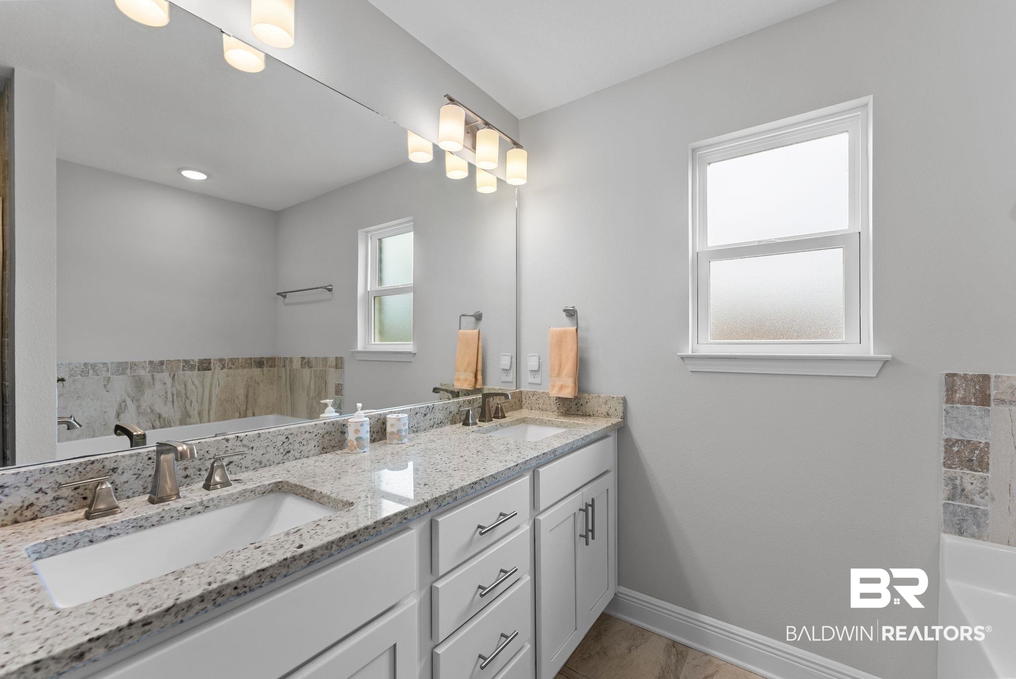 32868 Arbor Ridge Circle Lillian, AL 36549 - Photo 22 of 35 Bathroom featuring a garden tub and double vanity