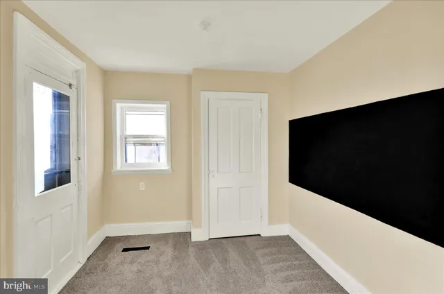 an empty room with window