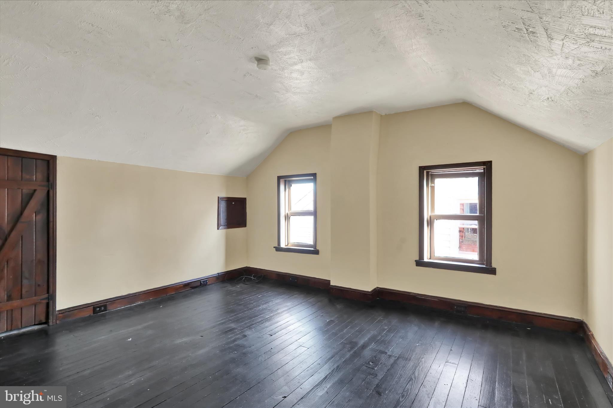 832 Houston Street Columbia, PA 17512 - Photo 16 of 24 an empty room with wooden floor and windows