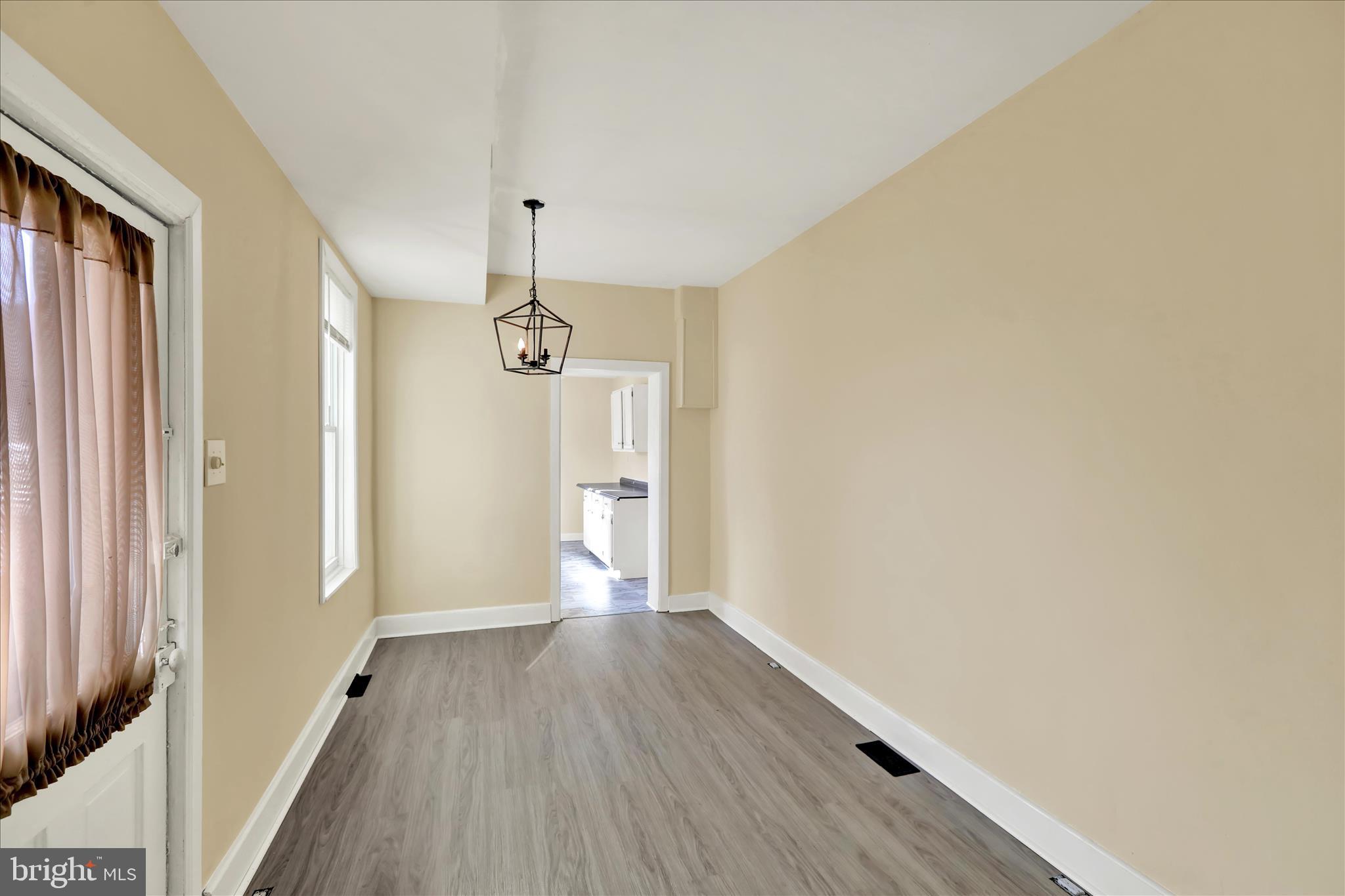 832 Houston Street Columbia, PA 17512 - Photo 18 of 24 a view of a hallway with wooden floor