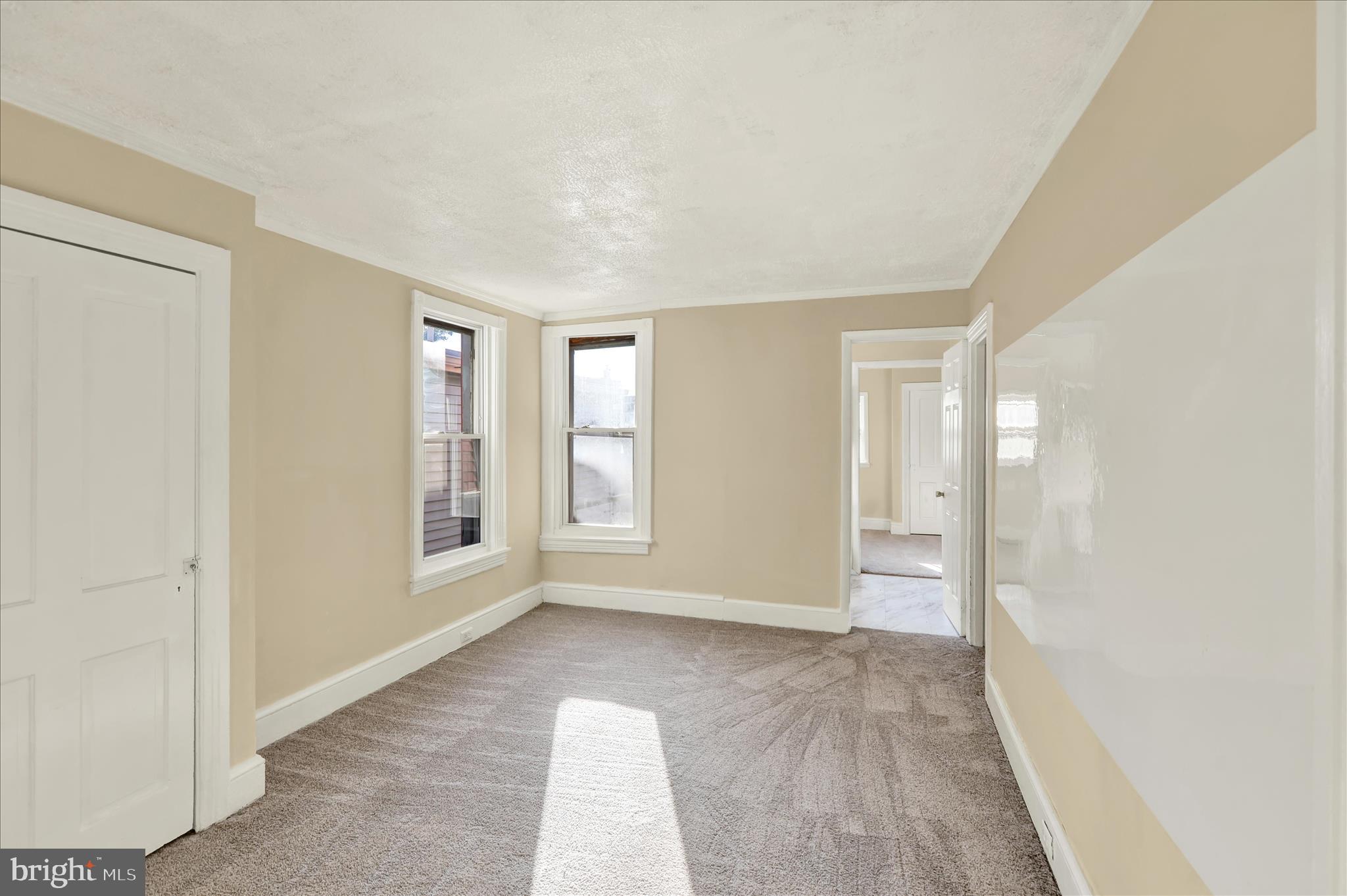 832 Houston Street Columbia, PA 17512 - Photo 8 of 24 an empty room with windows and closet