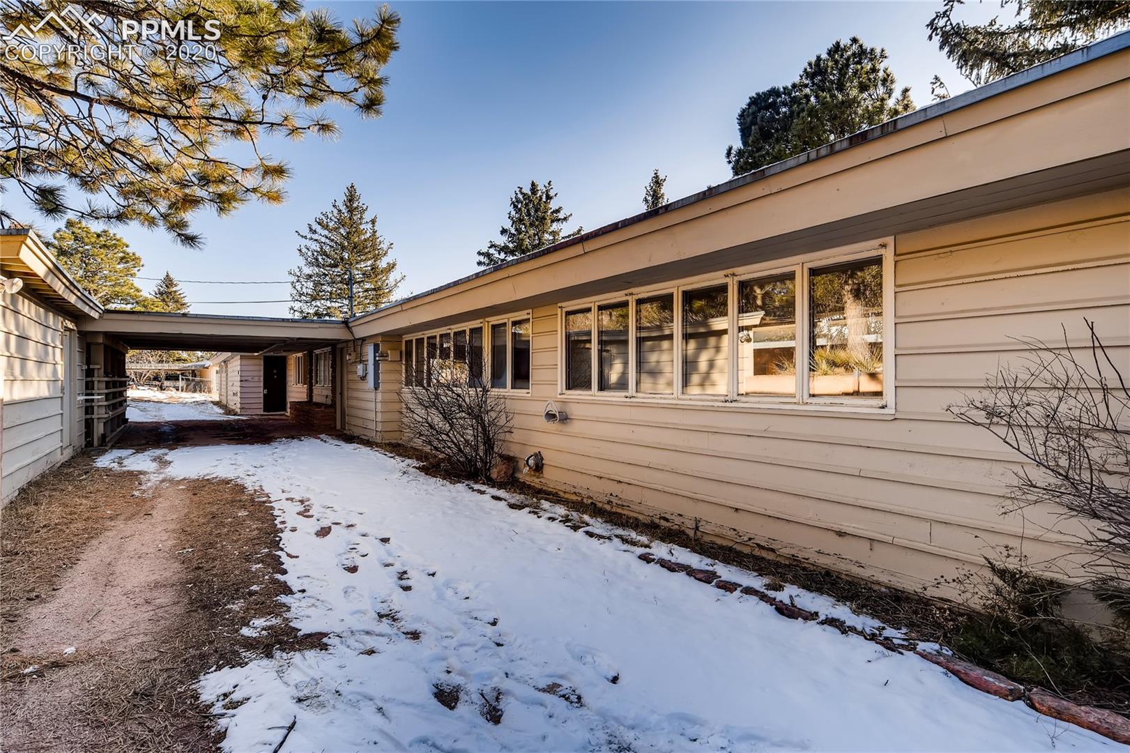 7720 Marriott Road Cascade, CO 80809 - Photo 1 of 28 Covered Parking at Front of House