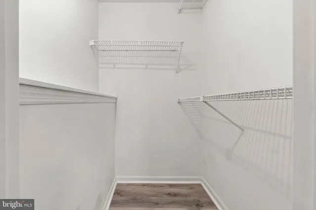 a view of a room with racks on the wall