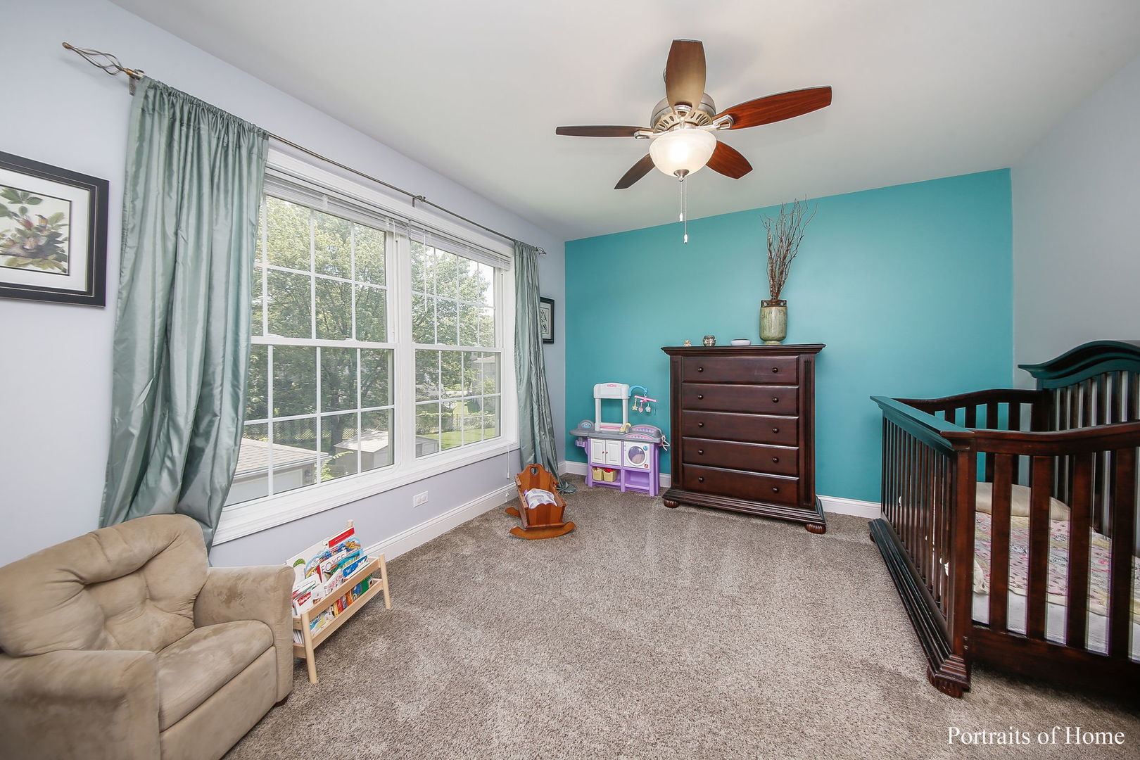 231 Highland Road Willowbrook, IL 60527 - Photo 20 of 38 a bedroom with furniture and a large window