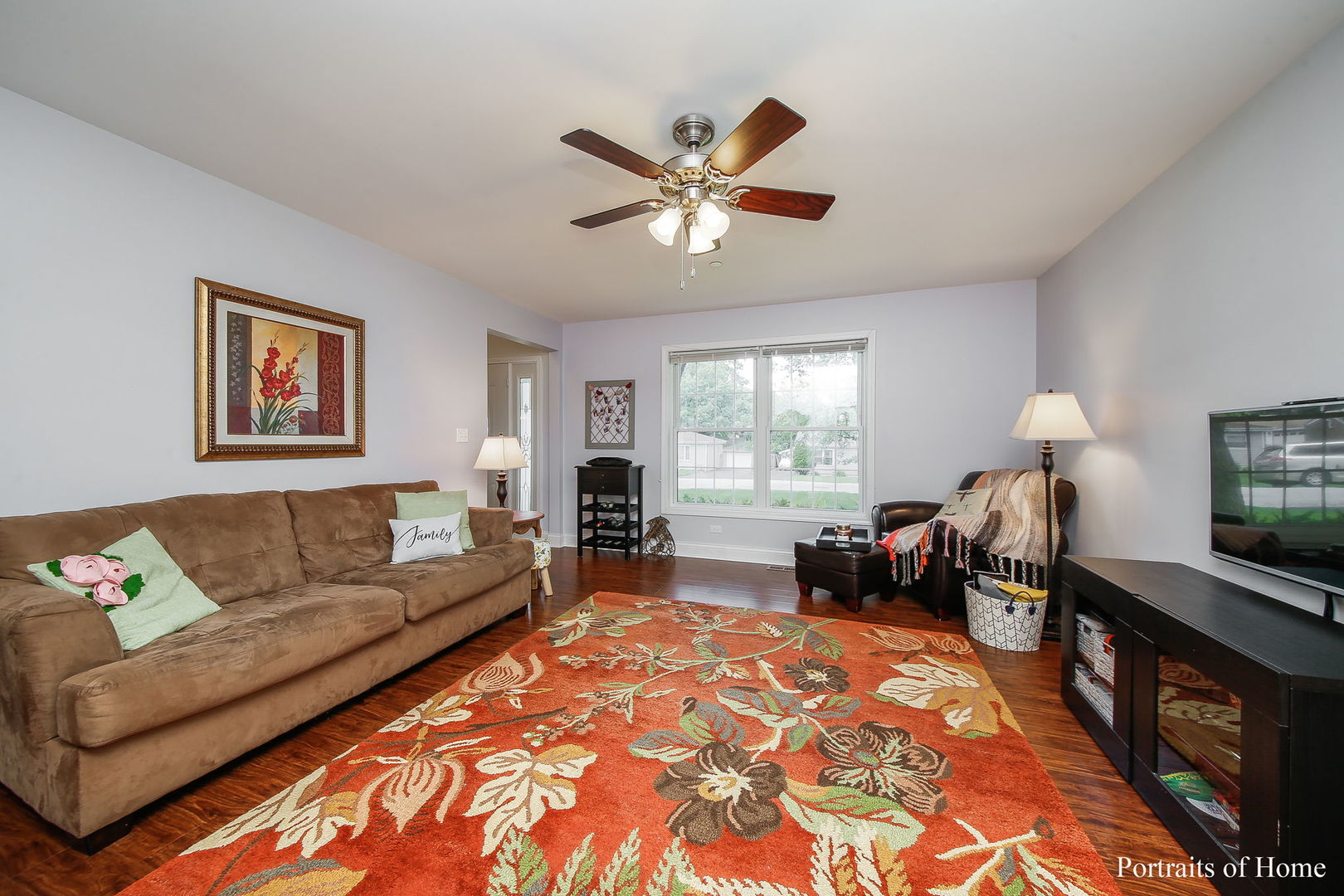 231 Highland Road Willowbrook, IL 60527 - Photo 4 of 38 a living room with furniture and a window