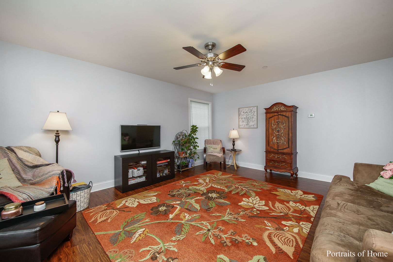 231 Highland Road Willowbrook, IL 60527 - Photo 5 of 38 a bedroom with a bed and a television