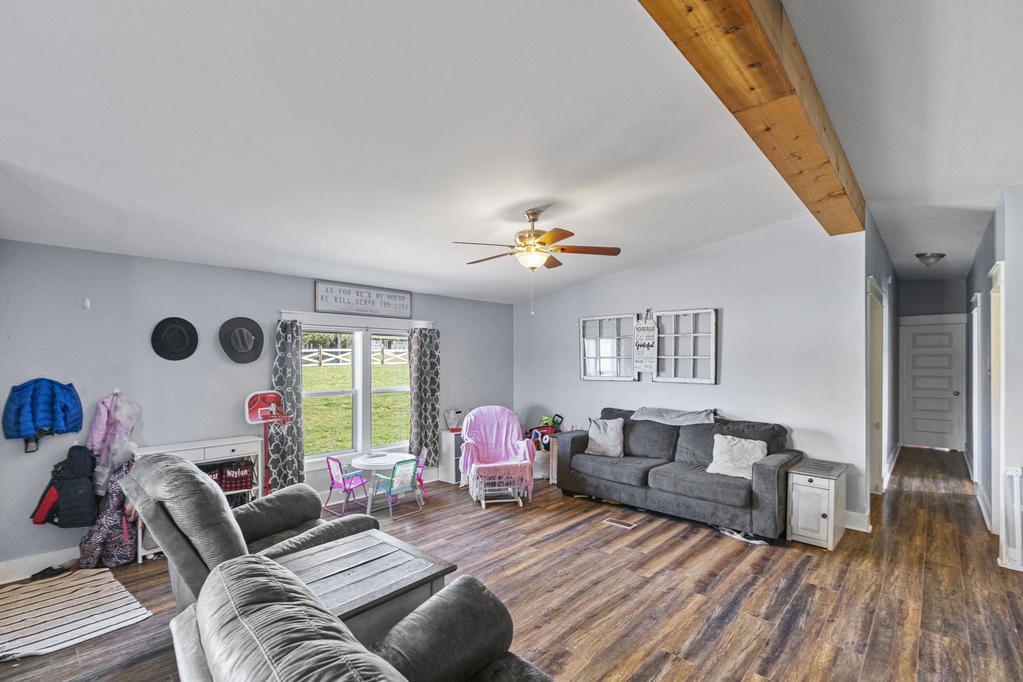 3972 Armstrong Road Springfield, TN 37172 - Photo 9 of 39 a living room with furniture and a wooden floor