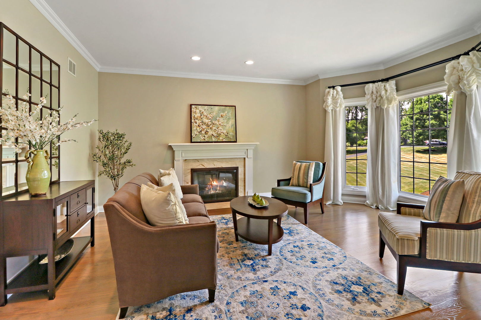 31 Overbrook Road South Barrington, IL 60010 - Photo 22 of 65 a living room with furniture fireplace and large windows