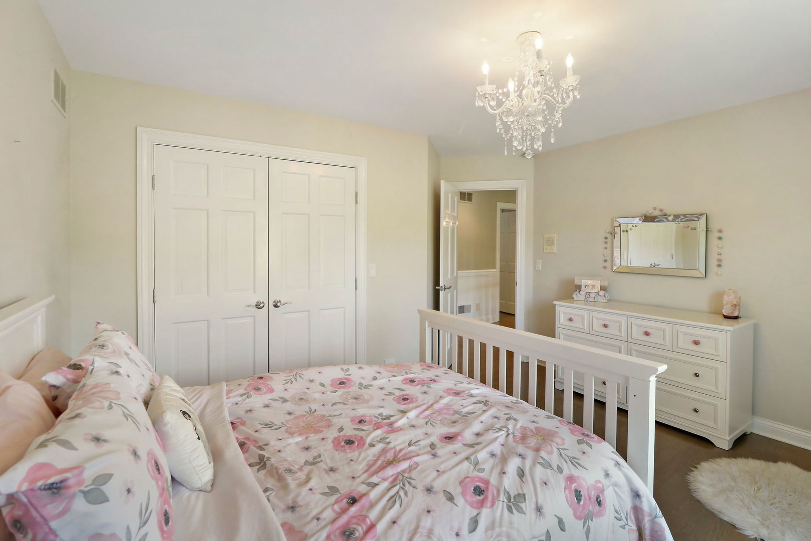 31 Overbrook Road South Barrington, IL 60010 - Photo 29 of 65 a bedroom with a bed and a chandelier