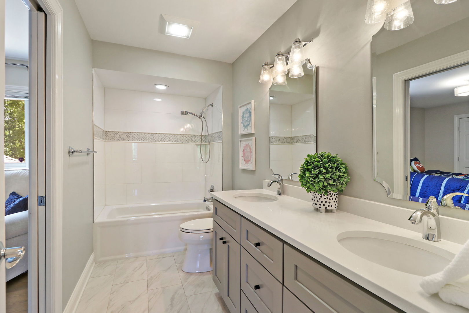 31 Overbrook Road South Barrington, IL 60010 - Photo 39 of 65 a bathroom with a granite countertop sink a toilet a large mirror and shower