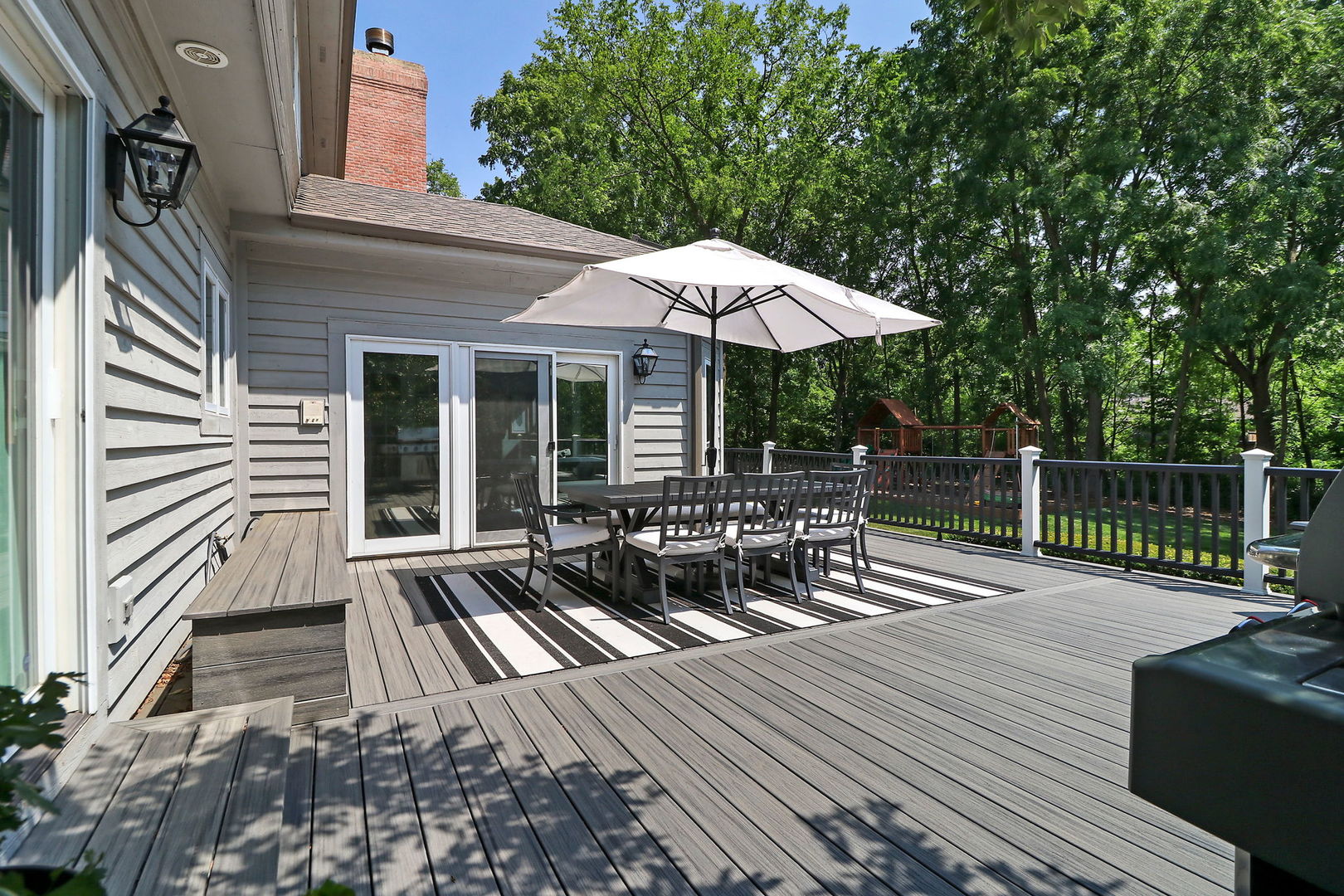 31 Overbrook Road South Barrington, IL 60010 - Photo 52 of 65 a view of a chairs and table on the wooden deck