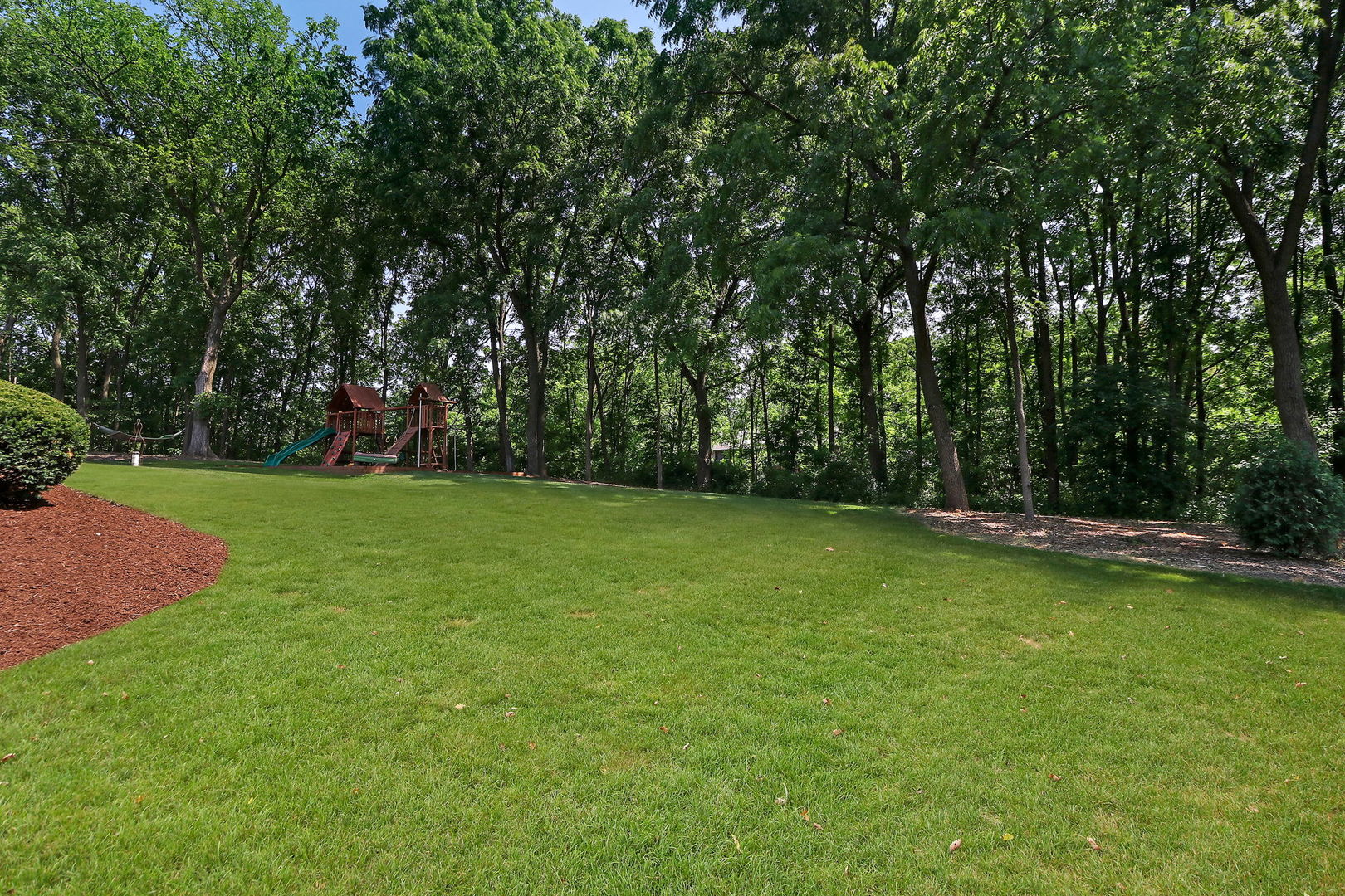 31 Overbrook Road South Barrington, IL 60010 - Photo 57 of 65 a view of a field with trees in the background
