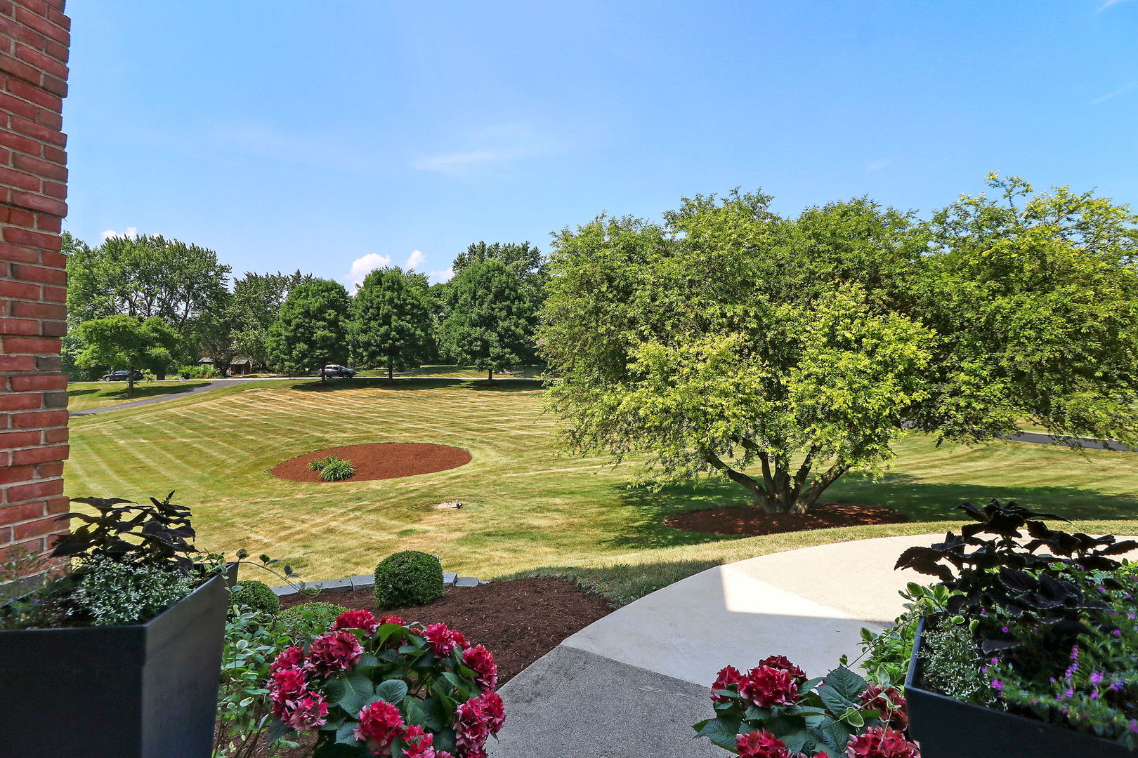 31 Overbrook Road South Barrington, IL 60010 - Photo 60 of 65 a view of a large pool with an outdoor space and seating area