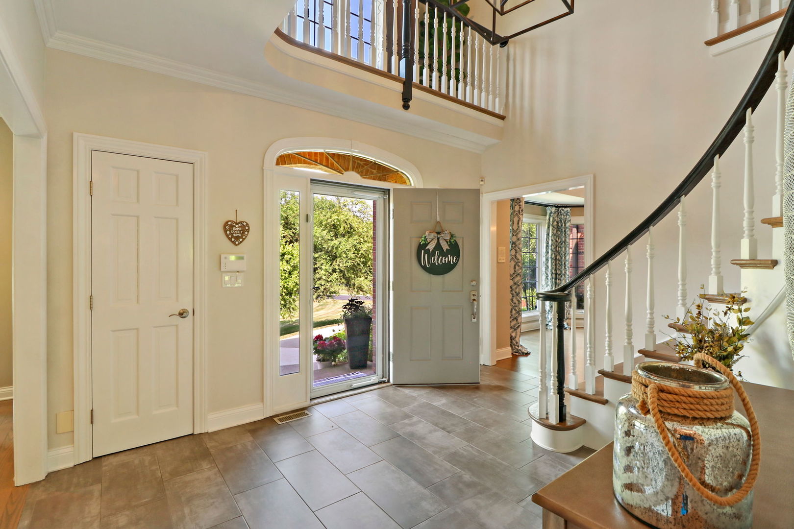 31 Overbrook Road South Barrington, IL 60010 - Photo 7 of 65 a view of entryway with stairs and furniture