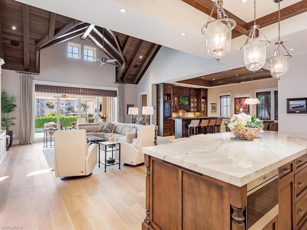 1482 2nd Avenue South Naples, FL 34102 - Photo 2 of 25 a view of a kitchen and living room