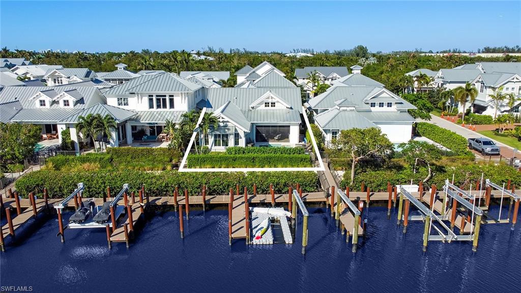 1482 2nd Avenue South Naples, FL 34102 - Photo 23 of 25 an aerial view of a house with swimming pool patio and outdoor seating