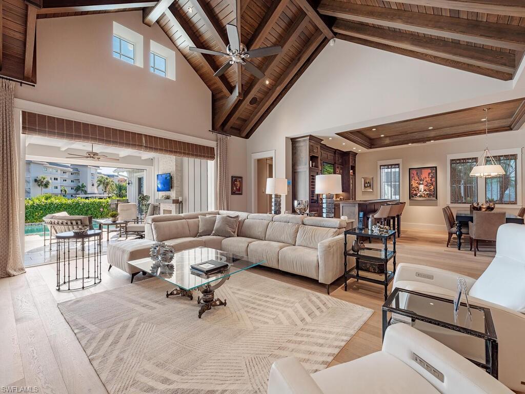 1482 2nd Avenue South Naples, FL 34102 - Photo 6 of 25 a living room with furniture and a large window
