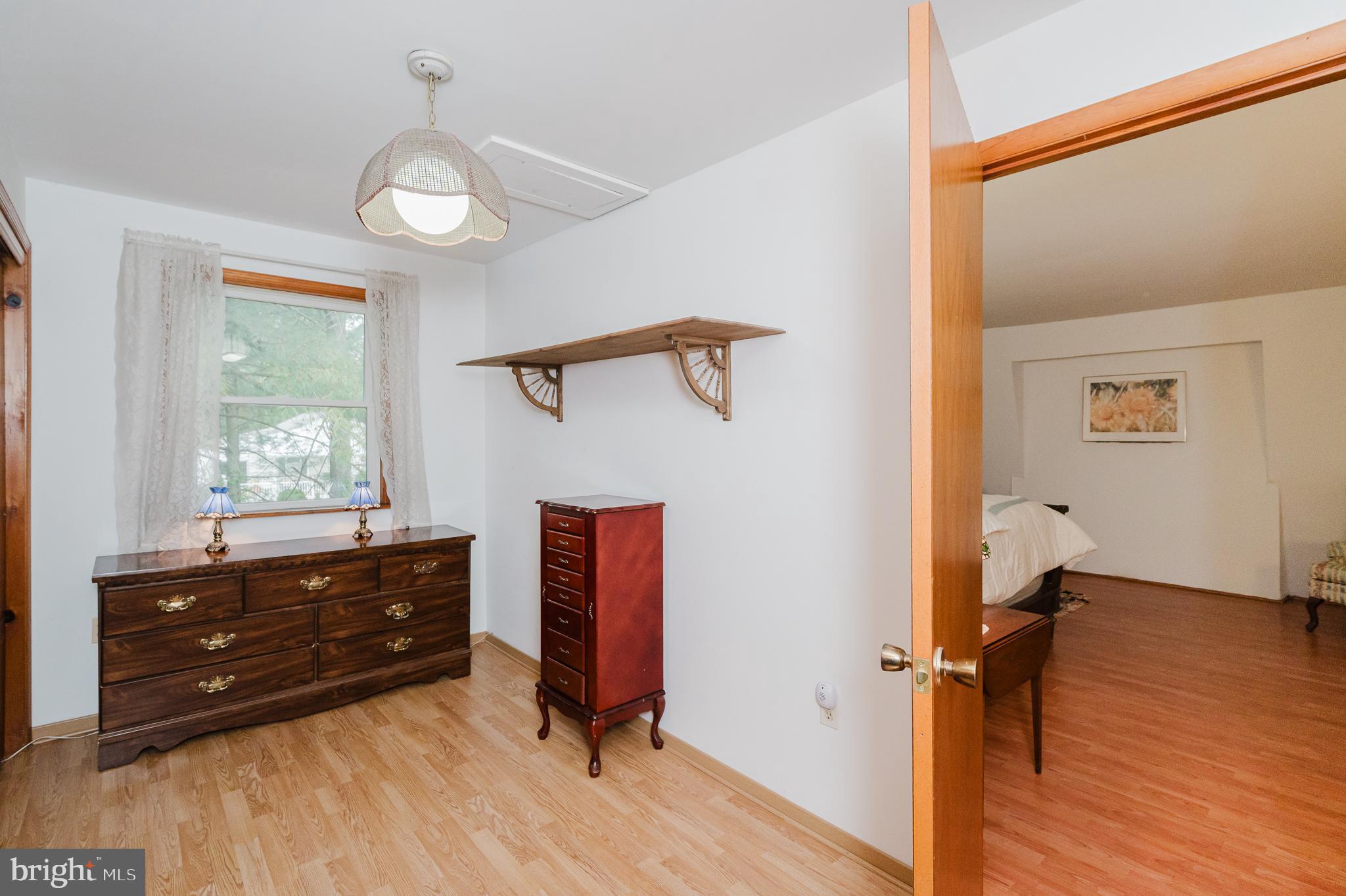 710 Magnolia Road Joppa, MD 21085 - Photo 28 of 58 a room with a dresser and a window